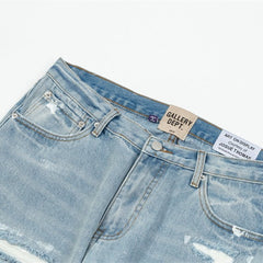 Gallery Dept Multi‑Rip Paint‑Splatter Flare Jeans