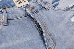 Gallery Dept Heavy‑Distressed Flare Jeans