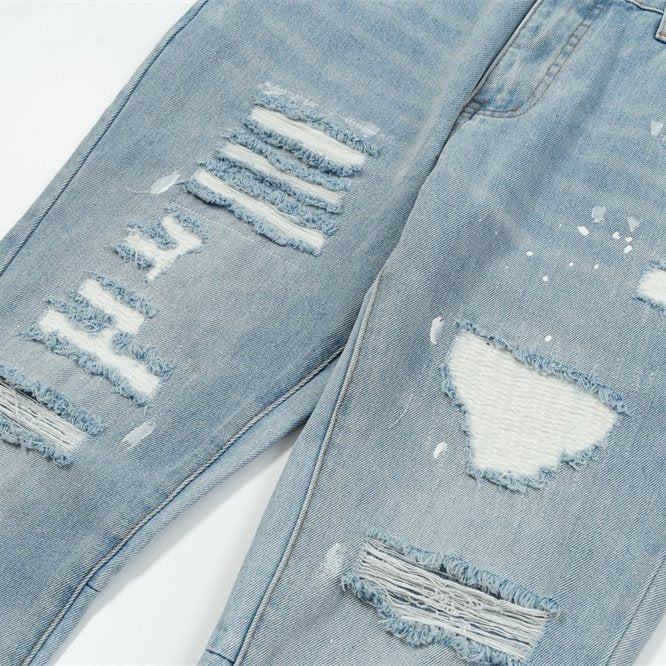 Gallery Dept Multi‑Rip Paint‑Splatter Flare Jeans